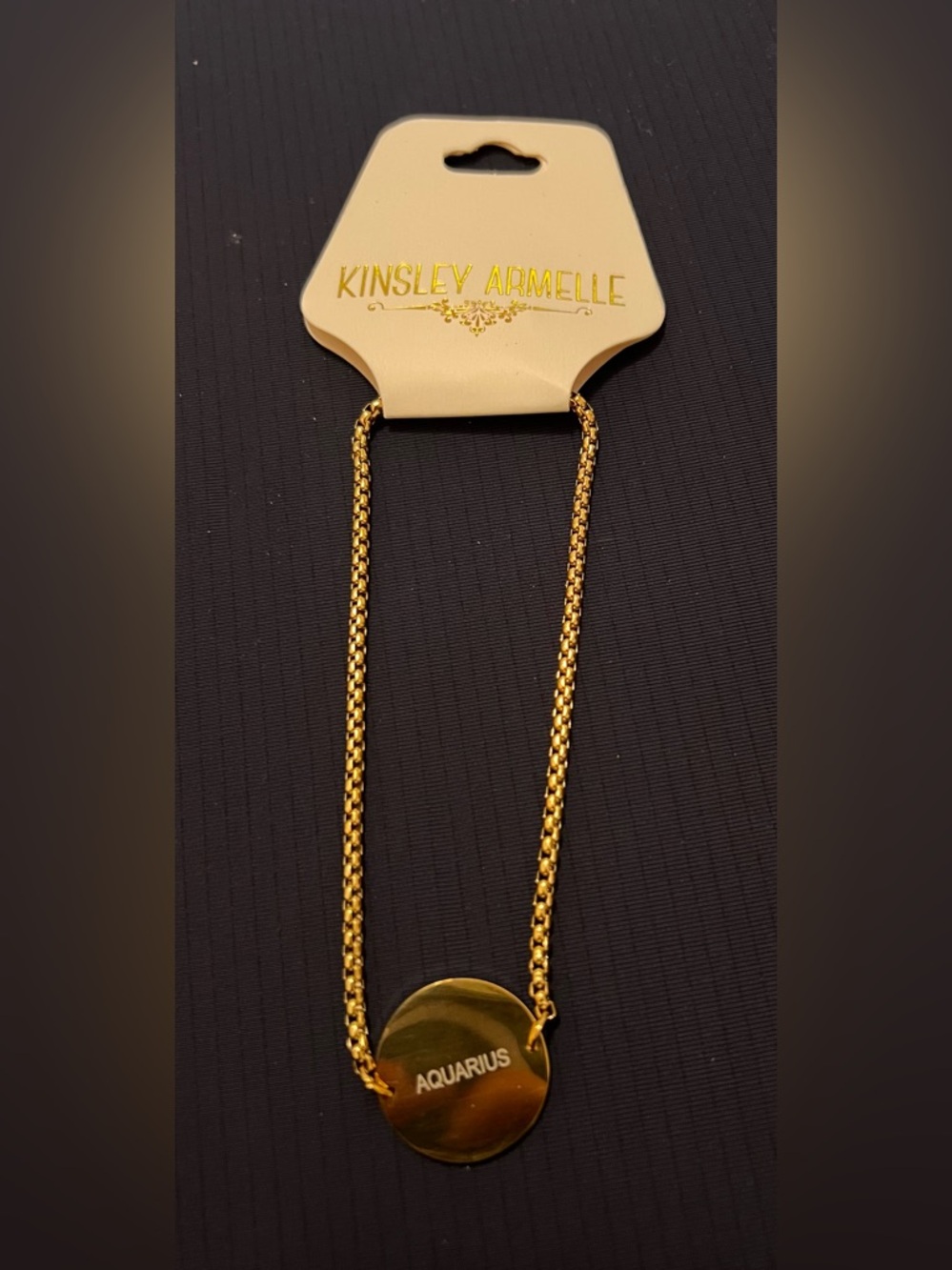 Kinsley Armelle Gold Tone Round Bolo Bracelet - Aquarius